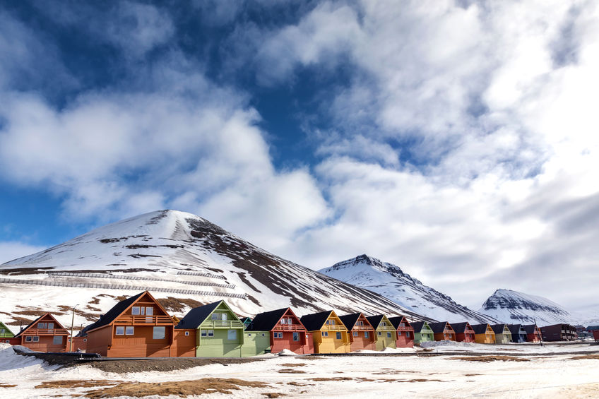 row of colourful chalet houses in longyearbyen, svalbard